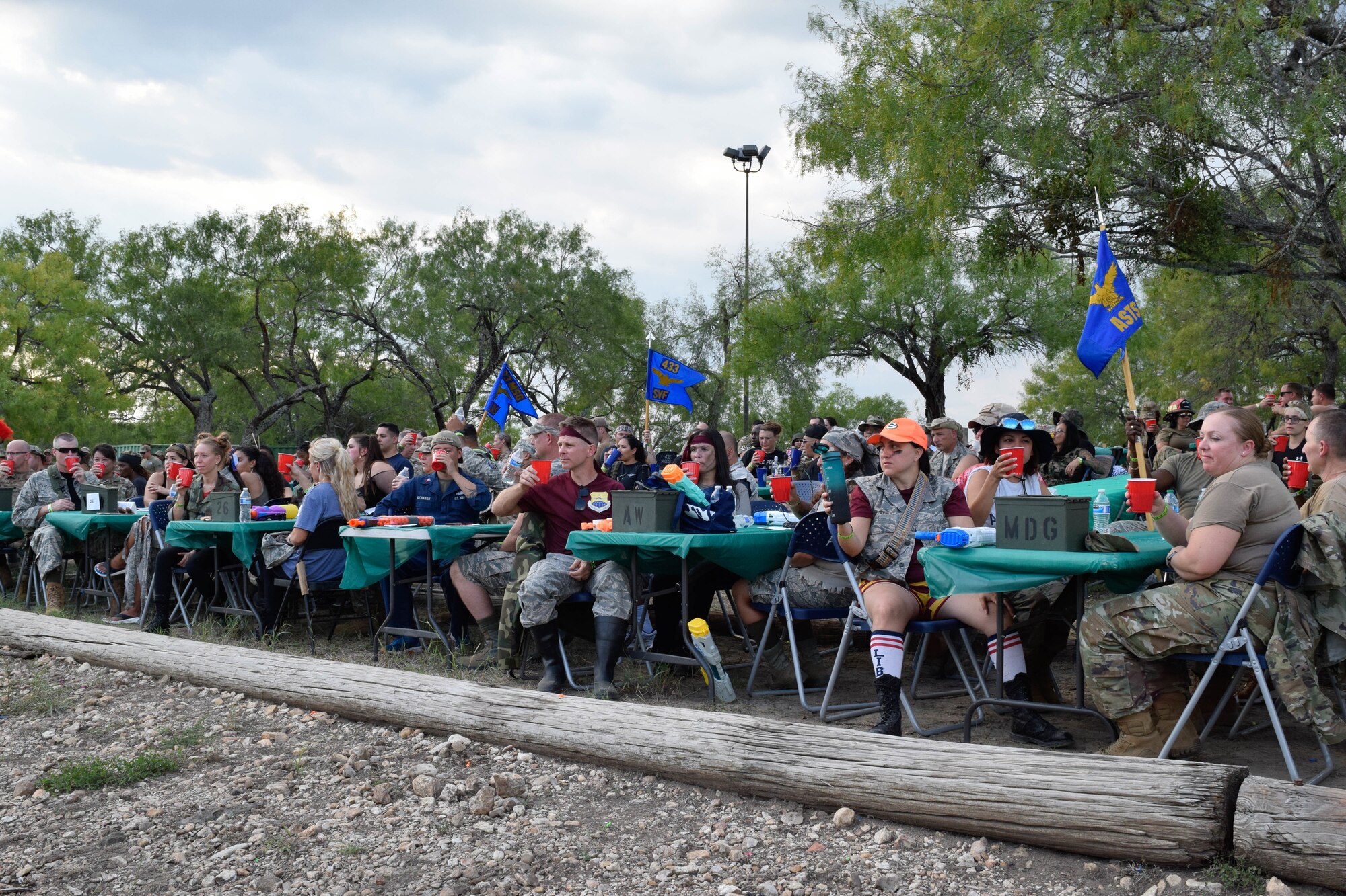 Airmen with the 433rd Airlift Wing attend the combat dining-in event at Joint Base San Antonio-Chapman Training Annex, Texas, Sept. 10, 2022. Each group and squadron within the wing had assigned tables during the event. (U.S. Air Force photo by Senior Airman Brittany Wich)