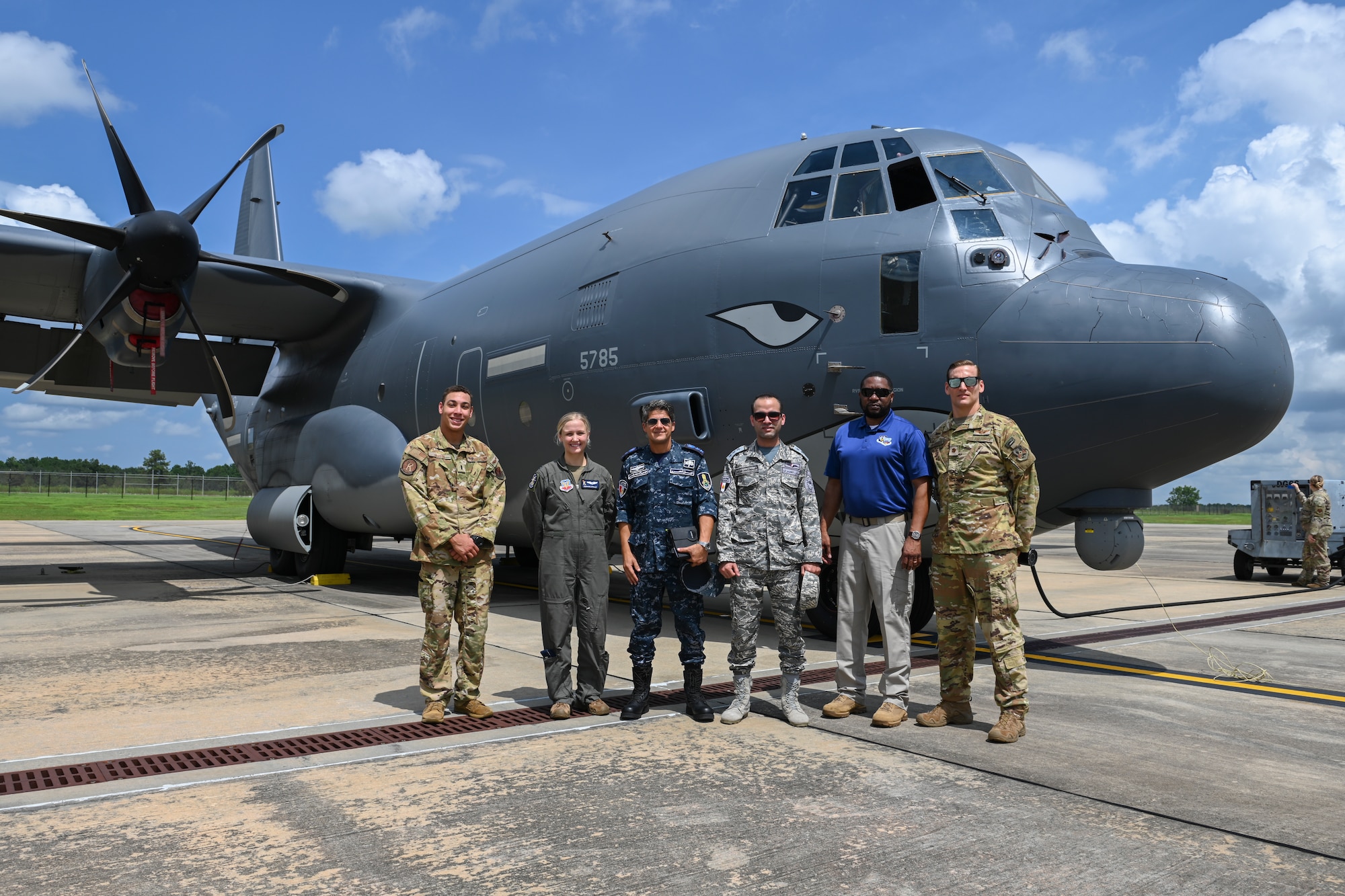U.S. Air Force Airmen assigned to the 71st Rescue Squadron, Egyptian Air Force and Navy members, and Airmen assigned to the 9th Air Force, pose for a photo in front of a C-130J Combat King II during a CSAR subject matter expert exchange at Moody Air Force Base, Georgia, Sept. 13, 2022. Egypt and the United States share a strategic security relationship, which plays a leading role in regional security and efforts to combat the spread of extremism. Engagements such as this ensure that the security relationship is not only forged at the strategic level but also the tactical and operational levels, creating a cohesive, layered approach to creating a safe and stable theater. (U.S. Air Force photo by Airman 1st Class Rachel Coates)