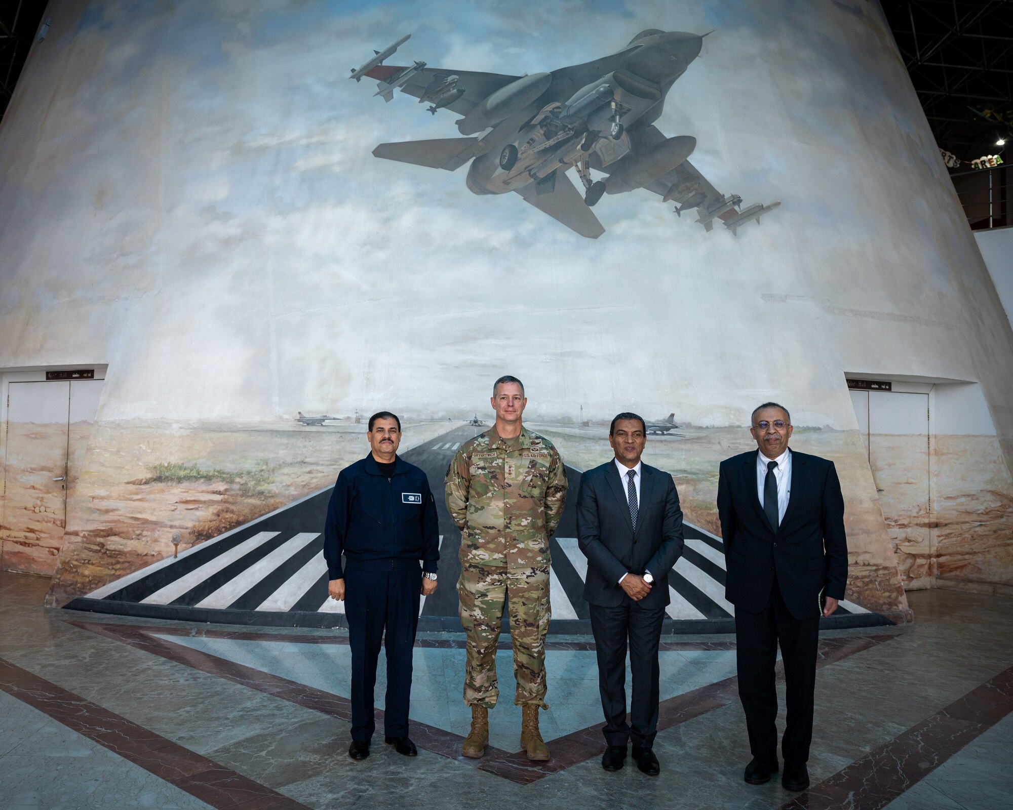 U.S. Air Force Lt. Gen. Alexus G. Grynkewich, Ninth Air Force (Air Forces Central) commander (center-left), poses for a photo with Maj. Gen. Ayman Abbas, Chief, Air Force Training Division (left), Maj. Gen. (Ret.) Magdy Dwaidar, Director, Egyptian Air Force Museum (middle), and Atef Wahba, Cultural Advisor to the Commander, AFCENT, at the Egyptian Air Force Museum in Cairo, Egypt, Aug. 29, 2022. During his visit, Grynkewich experienced the vibrant culture of Egypt while learning about the country’s unique military history. (U.S. Air Force photo by Senior Airman Dominic Tyler)