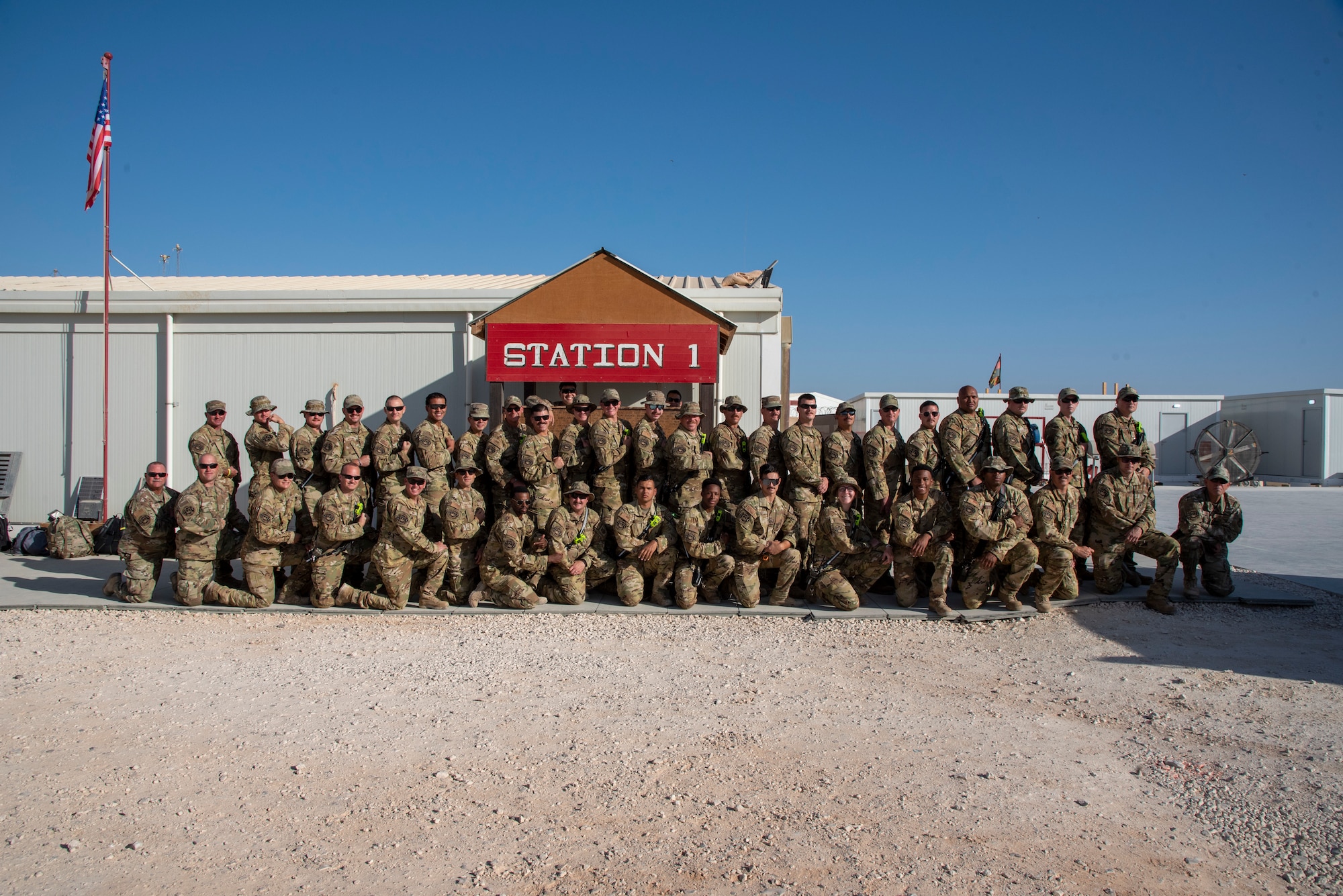 Firefighters with 332d Fire and Emergency Services display their Suicide Awareness patches at an undisclosed location in Southwest Asia, Sept. 22, 2022. These patches were made by the Department of Defense Fire and Emergency Services Post-Traumatic Stress Disorder and Suicide Initiative with the intention of spreading awareness of suicide and help those at risk find the help they need. (U.S. Air Force photo by: Tech. Sgt. Jim Bentley)