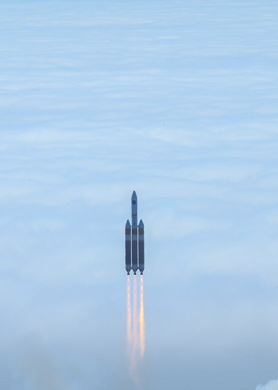 A rocket flies through the sky