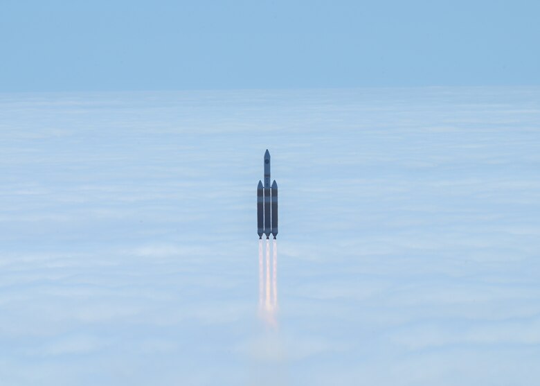 A rocket flies through the sky