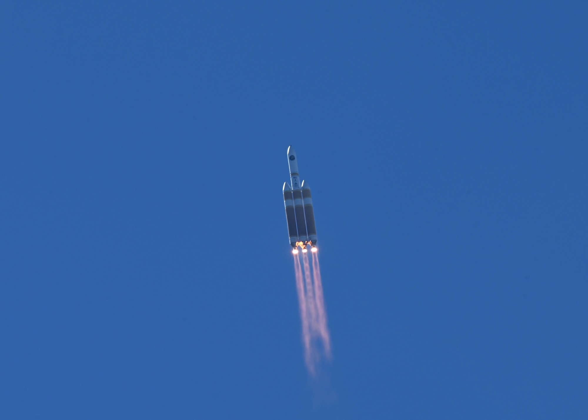 A rocket flies through the sky