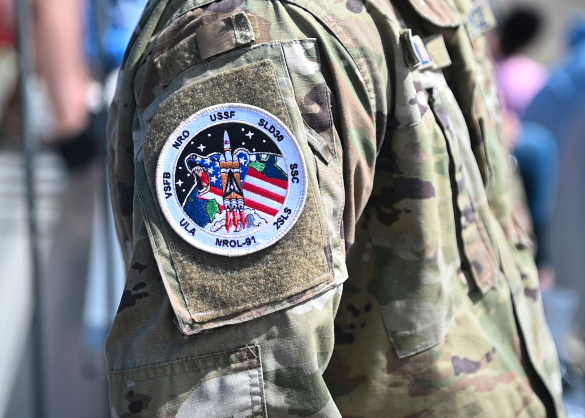 A Velcro launch patch on the persons shoulder