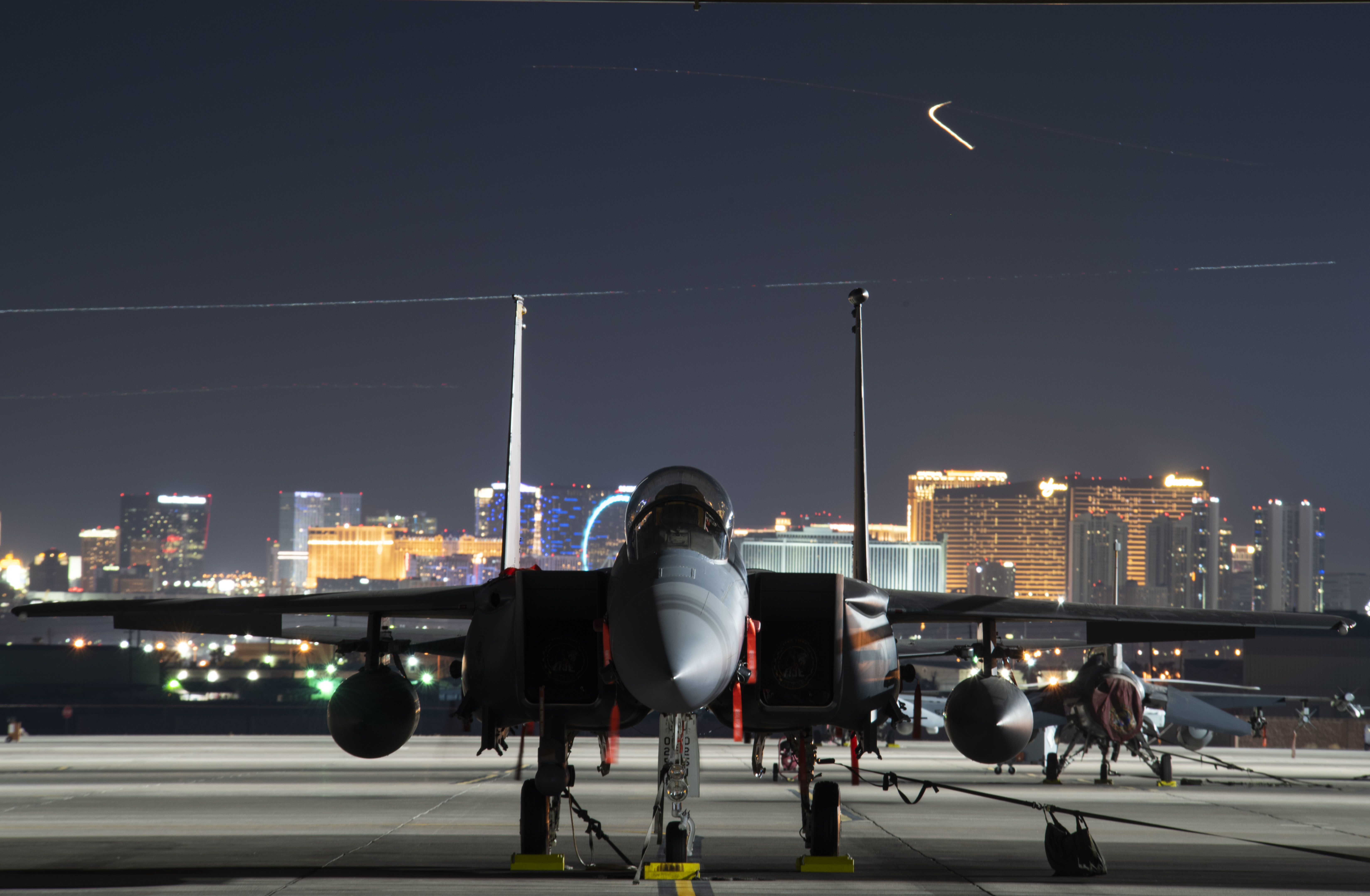 An F-15E Strike Eagle fighter jet assigned to the 17th Weapons Squadron sits on the flight line on Nellis Air Force Base, Nevada, Oct. 13, 2019. The Weapons School consists of 19 weapons squadrons entailing a multitude of different aircraft from across the country. (U.S. Air Force photo by Airman 1st Class Bryan Guthrie)