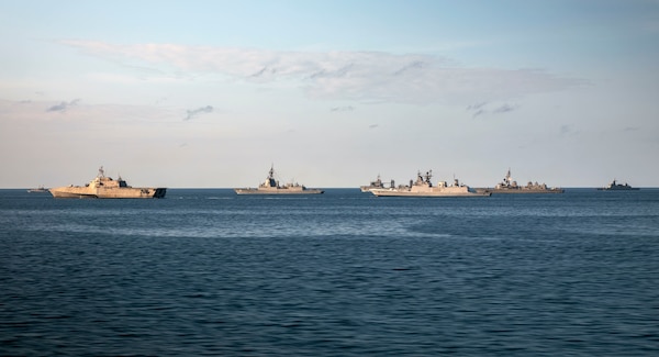 ARAFURA SEA (Sept. 20, 2022) Participant ships of Royal Australian Navy (RAN) Exercise Kakadu 2022 (KA22) sail in formation in the waters off Northern Australian, Sept. 20, 2022. KA22 is the 15th iteration of the RAN’s flagship biennial regional maritime international engagement exercise, drawing together approximately 3000 personnel, 15 warships and more than 30 aircraft from 22 countries. (Photo courtesy of Royal Australian Navy LSIS Jarryd Capper)