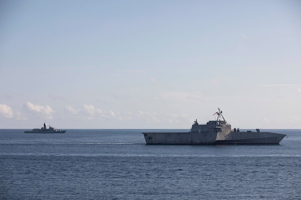 ARAFURA SEA (Sept. 19, 2022) The Independence-variant littoral combat ship USS Charleston, right, sails with Royal Australian Navy (RAN) frigate HMAS Perth (FFH 157) during the RAN Exercise Kakadu 2022 (KA22) in the waters off Northern Australian, Sept. 19, 2022. KA22 is the 15th iteration of the RAN’s flagship biennial regional maritime international engagement exercise, drawing together approximately 3000 personnel, 15 warships and more than 30 aircraft from 22 countries. (Photo courtesy of Royal Australian Navy LSIS Tara Morrison)