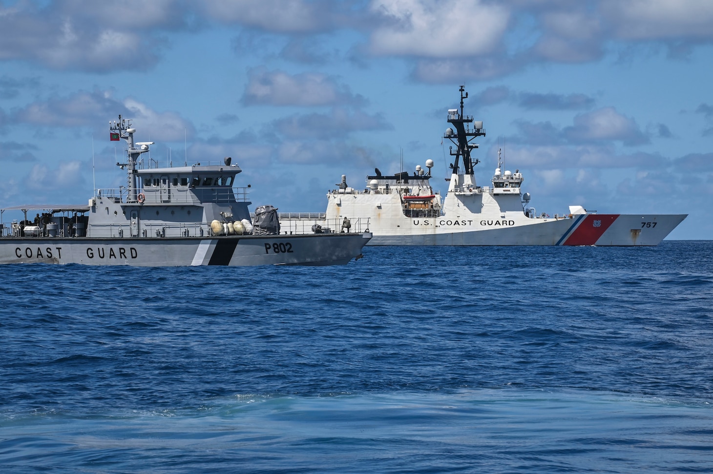 U.S. Coast Guard Cutter Midgett (WMSL 757) transits alongside the Maldivian Coast Guard ship Ghazee during a joint exercise held in the waters east of the Maldives, Sept. 22, 2022. These professional exchanges are designed to share expertise and best practices in completing missions. (U.S. Coast Guard photo by Petty Officer Steve Strohmaier)