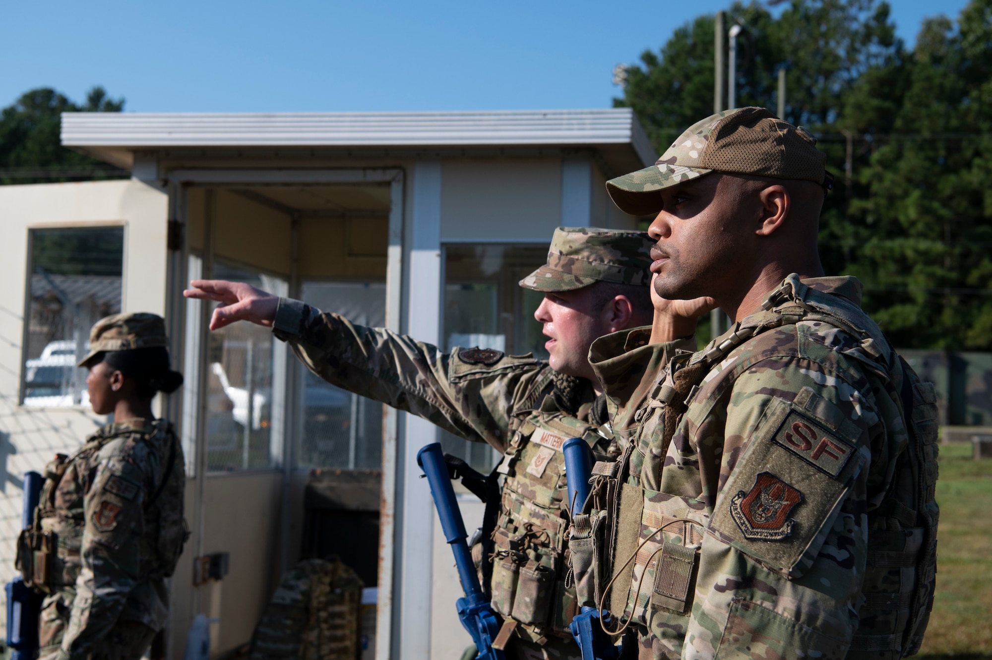 Tech. Sgt. Michael Mattern and Master Sgt. Derrick Stokes, both assigned to the 94th Security Forces Squadron, inspect the gate at Silver Flag during an exercise at Dobbins Air Reserve Base, Ga. Sept. 21, 2022. Dobbins ARB hosted, coordinated, and participated in a base-wide exercise, called United Forces 22-01, from Sept. 19-25 to test readiness capabilities. (U.S. Air Force photo by Senior Airman Kendra A. Ransum)