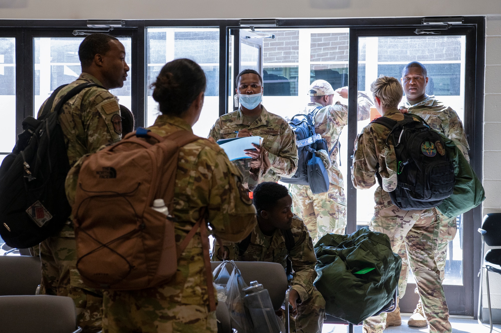 Members of the 94th Airlift Wing prepare to board the bus to Silver Flag during an exercise at Dobbins Air Reserve Base, Ga. Sept. 21, 2022. Dobbins ARB hosted, coordinated, and participated in a base-wide exercise, called United Forces 22-01, from Sept. 19-25 to test readiness capabilities. (U.S. Air Force photo by Senior Airman Kendra A. Ransum)