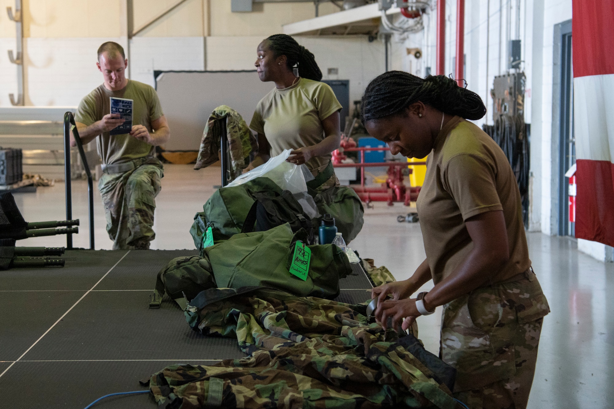 Members of the 94th Maintenance Squadron and 94th Aircraft Maintenance Squadron prepare Mission Oriented Protective Posture gear during an exercise at Dobbins Air Reserve Base, Ga. Sept. 22, 2022. Dobbins ARB hosted, coordinated, and participated in a base-wide exercise, called United Forces 22-01, from Sept. 19-25 to test readiness capabilities. (U.S. Air Force photo by Senior Airman Kendra A. Ransum)