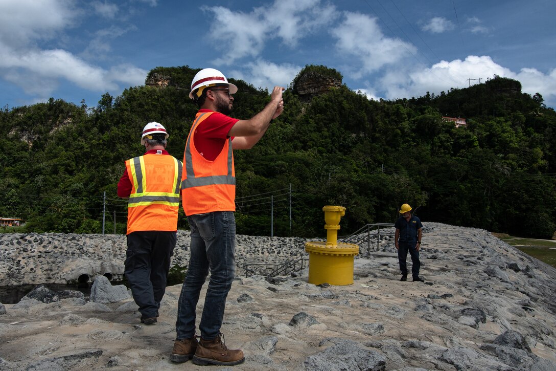 The U.S. Army Corps of Engineers and Autoridad de Energía Eléctrica (AEE) inspect the Guajataca Dam after the passing of Hurricane Fiona. Guajataca Dam is one of the 37 dams around the Island. USACE and AEE are partners to ensure that structures such as the Guajataca Dam are monitored and inspected as a part of our overall Dam Safety program. Life safety is our number one priority. (USACE photo by Brigida Sanchez)