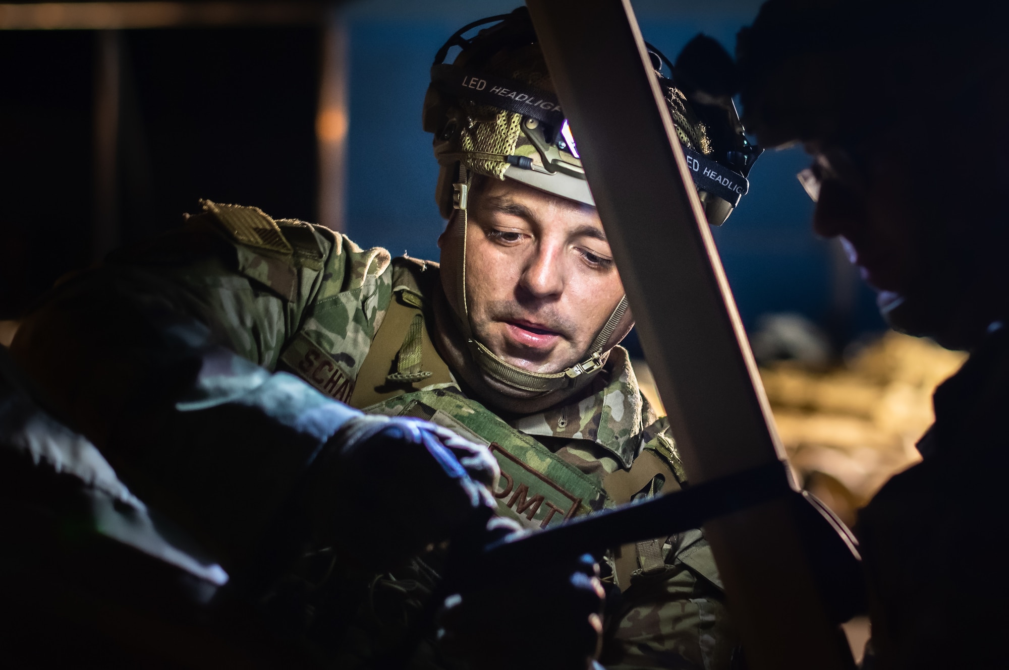 U.S. Air Force Master Sgt. Robert Schaffer, 435th Contingency Response Support Squadron independent duty medical technician, sets up a medical tent during exercise Agile Wolf 22 at Koszalin, Poland, Sept. 12, 2022. The 435th Contingency Response Group is USAFE's only expeditionary open-the-base force, comprising 39 career fields which allow them to set up and run a fully functioning base within hours. (U.S. Air Force photo by Airman 1st Class Jared Lovett)