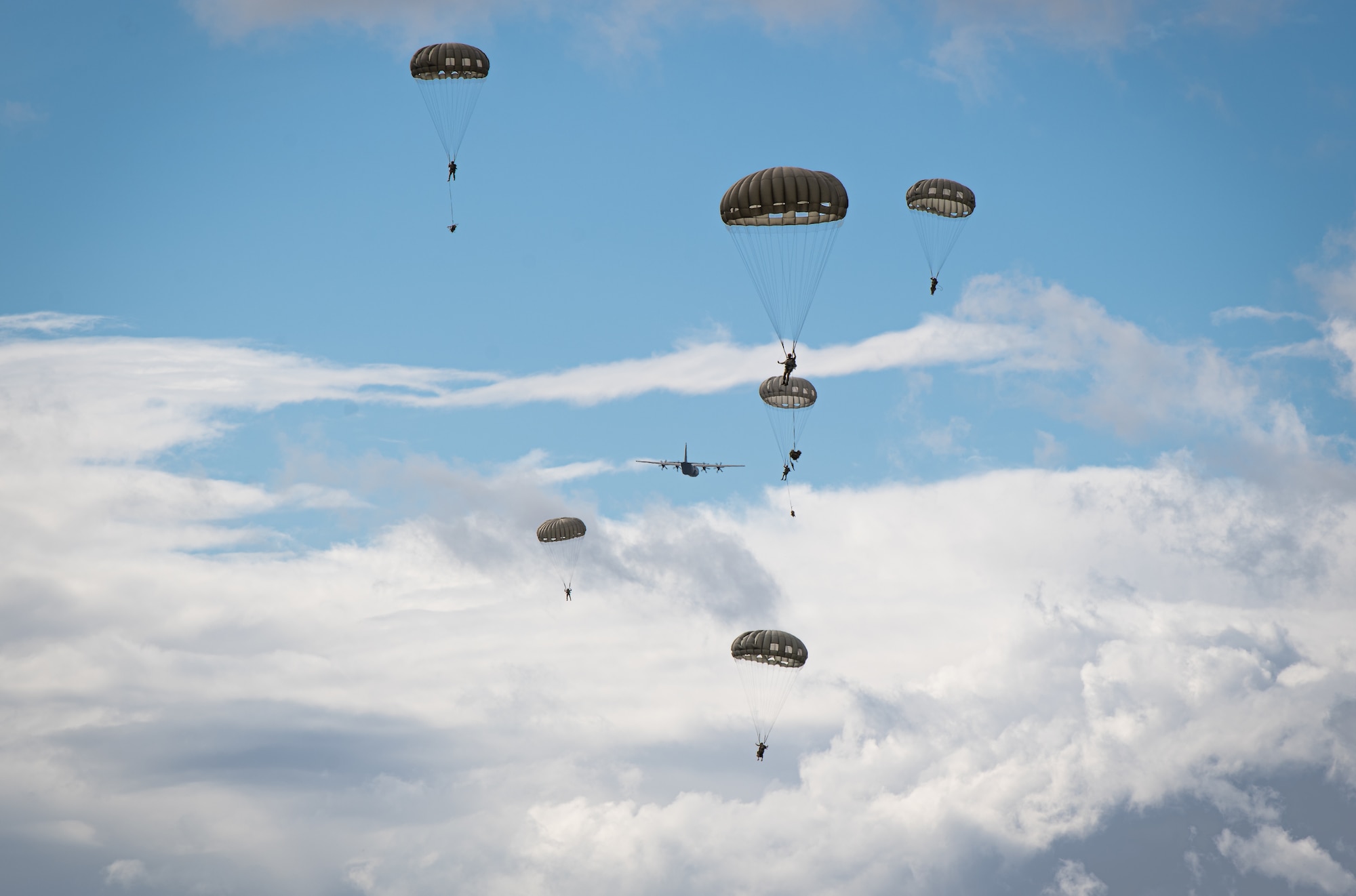 Airmen assigned to the 435th Contingency Response Group jump out of a C-130J Super Hercules aircraft assigned to the 37th Airlift Squadron during exercise Agile Wolf 22 at Koszalin, Poland, Sept. 14, 2022. Eleven Airmen from the 435th CRG conducted a airbourne insertion and airfield assessment for follow-on forces. (U.S. Air Force photo by Airman 1st Class Jared Lovett)