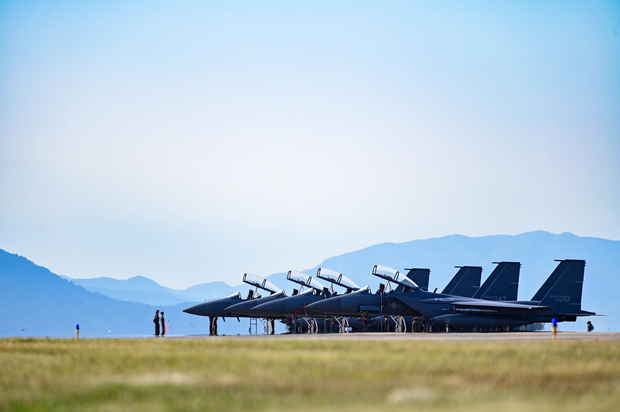 Republic of Korea Air Force F-15K Slam Eagles assigned to the 110th Fighter Squadron sit on the runway during a routine training at Kunsan Air Base, Republic of Korea, Sept. 22, 2022. The training provides participants the opportunity to introduce and review tactics, as well as exchange mission planning ideas. (U.S. Air Force Photo by Senior Airman Shannon Braaten)