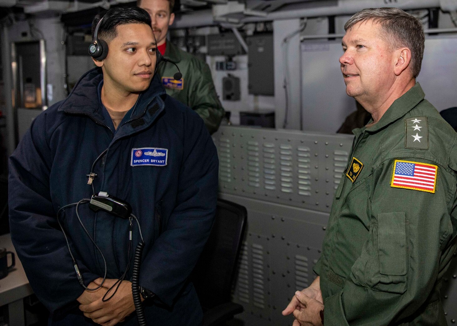 Vice Adm. Thomas E. Ishee, commander, U.S. Sixth Fleet and Naval Striking and Support Forces NATO, speaks with Operation Specialist 1st Class Spencer Bryant Sailors during a visit to the Nimitz-class aircraft carrier USS George H.W. Bush (CVN 77), Sept. 22, 2022. The George H.W. Bush Carrier Strike Group is on a scheduled deployment in the U.S. Naval Forces Europe area of operations, employed by U.S. Sixth Fleet to defend U.S., allied, and partner interests.