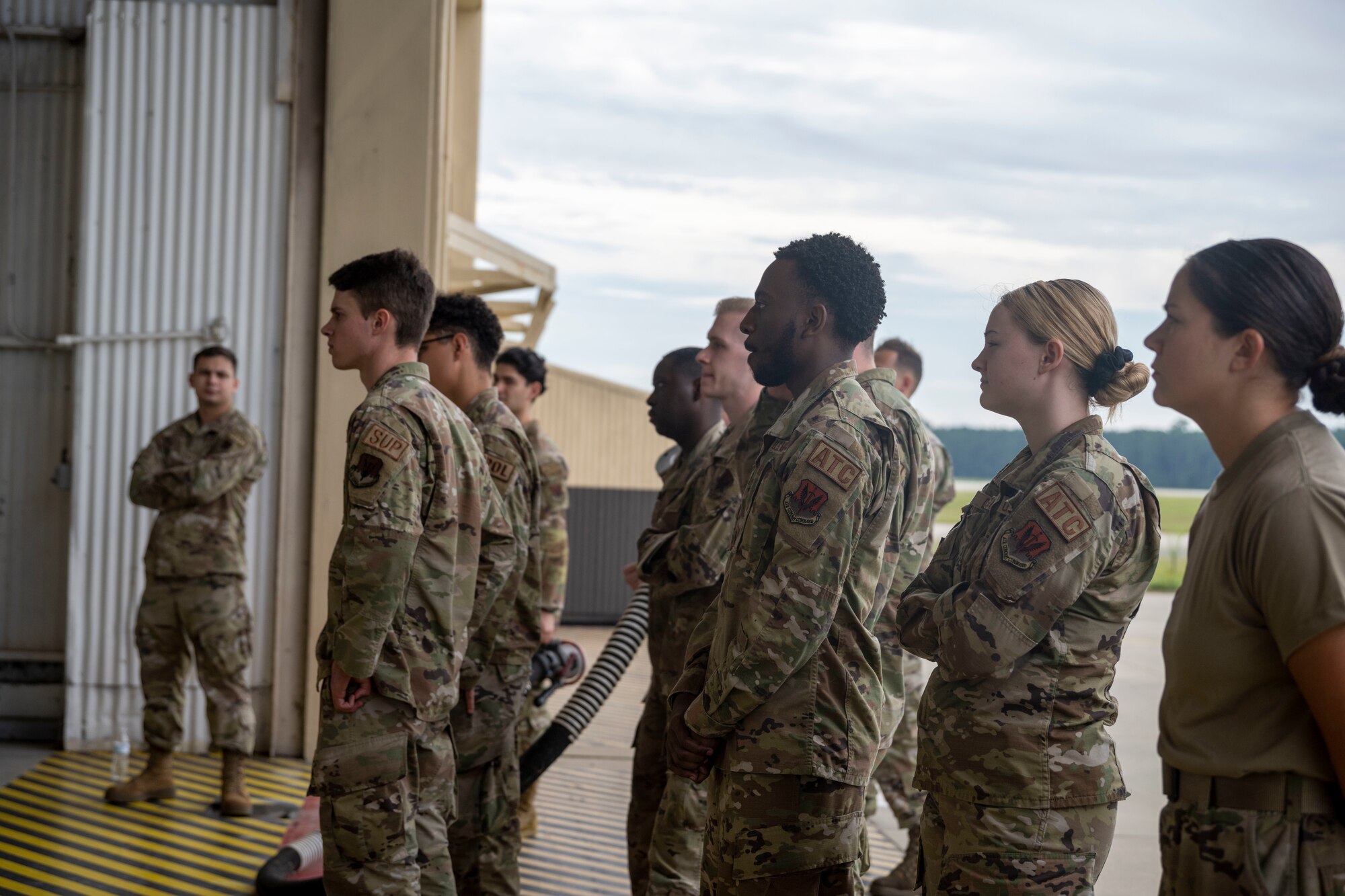 Airmen assigned to the 4th Fighter Wing participate in a Multi-Capable Airman exercise at Seymour Johnson Air Force Base, North Carolina, Sept. 12, 2022. The goal of MCA is to enable Airmen to fill multiple roles to reduce overall foot traffic and operate with the fewest amount of people needed. (U.S. Air Force photo by Senior Airman Kevin Holloway)
