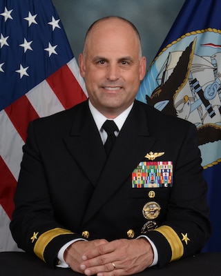 Rear Adm. Brad Dunham poses for a photograph.