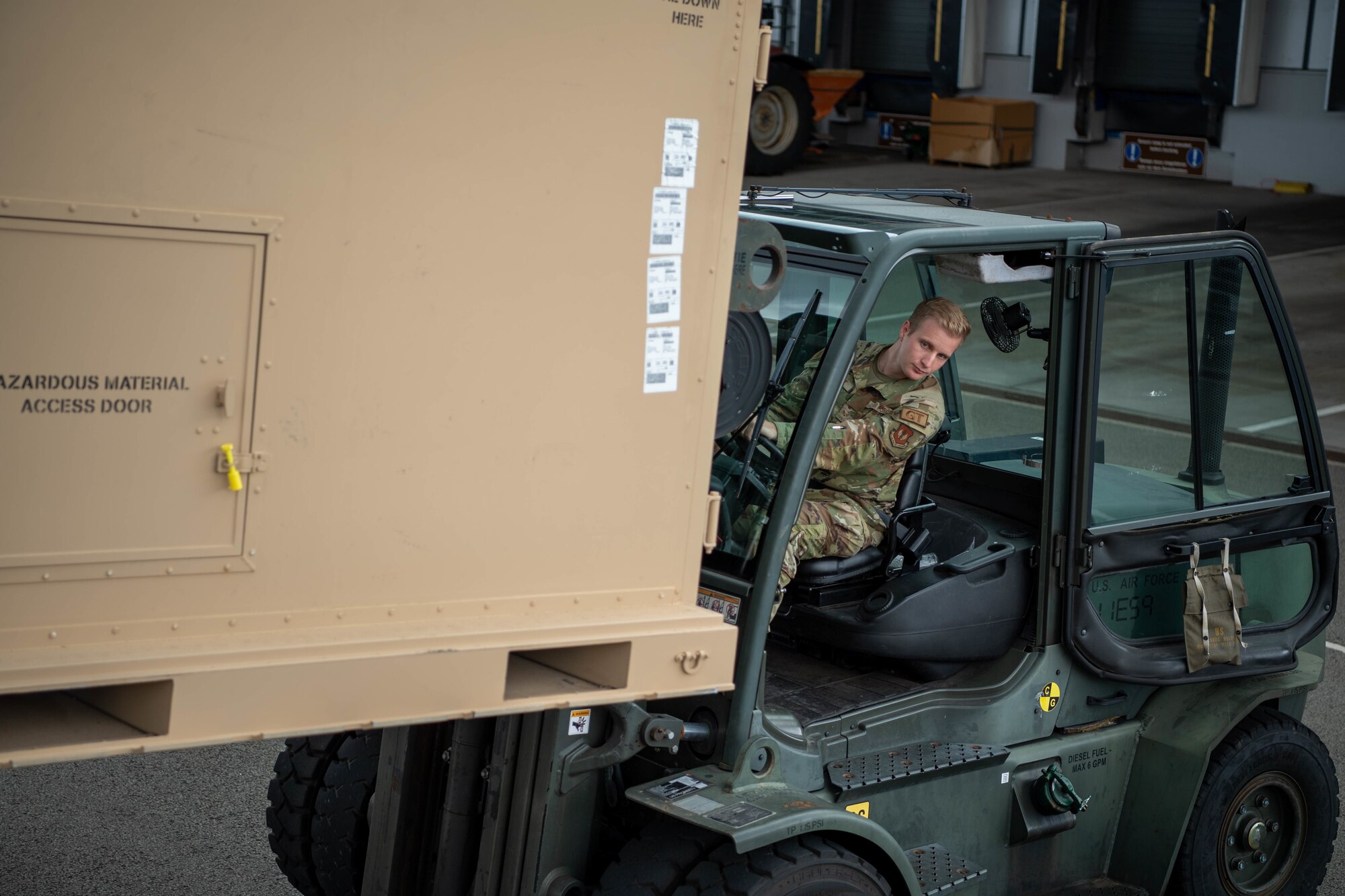 Man drives forklift