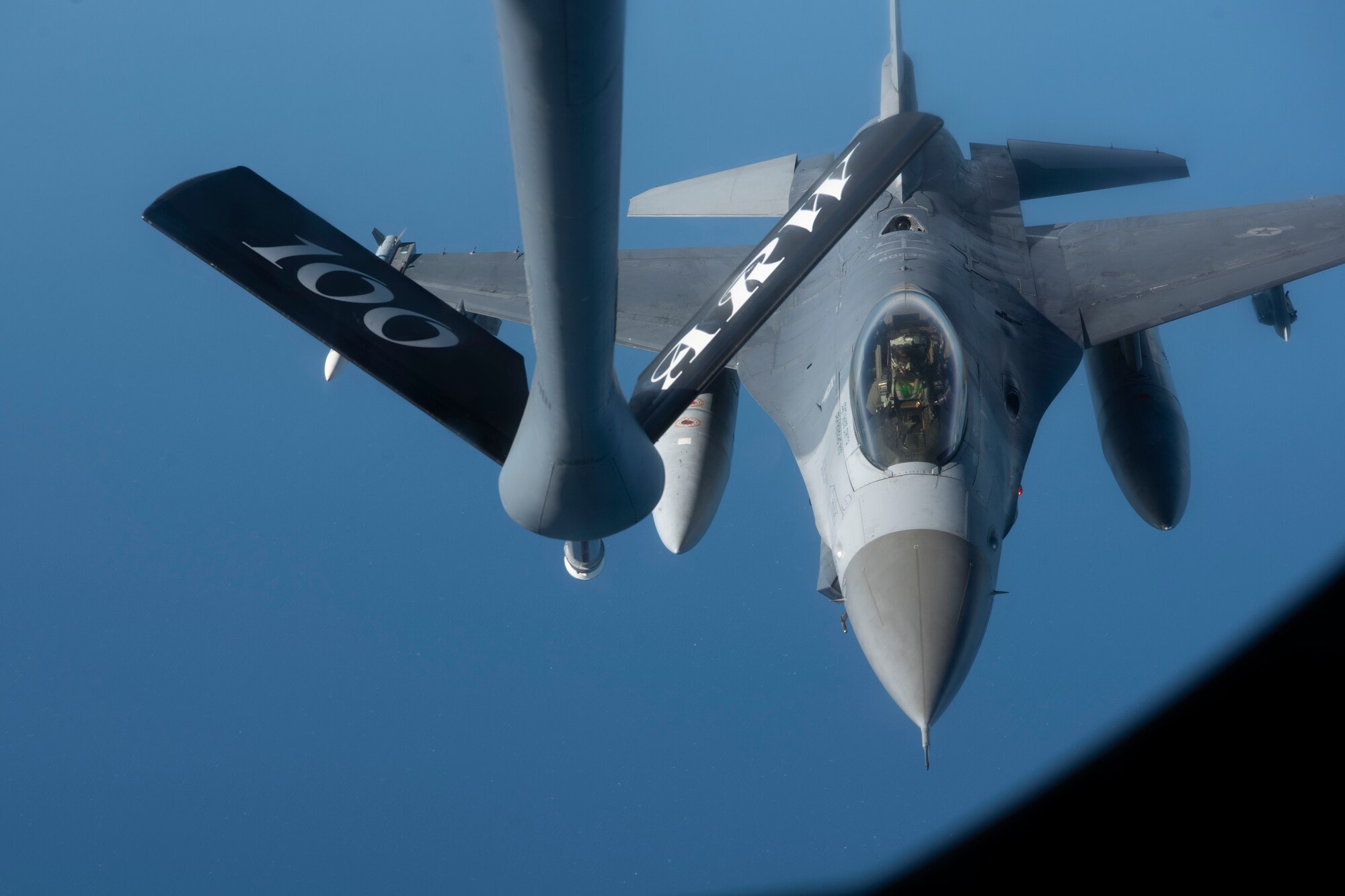 A U.S. Air Force F-16C Fighting Falcon aircraft assigned to the 31st Fighter Wing approaches a KC-135 Stratotanker aircraft assigned to the 100th Air Refueling Wing over the North Sea during exercise Cobra Warrior 22, Sept. 21, 2022. The partnerships created through recurring training events like Cobra Warrior, better support the ability to employ a strategic force in theater whenever called upon. (U.S. Air Force photo by Tech. Sgt. Anthony Hetlage)