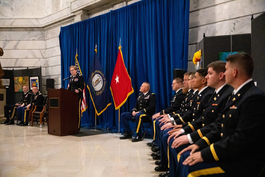 Army Lt. Col. Carla Raisler introduces the newly commissioned officers in a ceremony at the Kentucky State Capitol Rotundra in Frankfort, Ky. on Sept. 24, 2022. The new officers will be pinned by family and friends at the ceremony as part of commissioning tradition. (U.S. Army photo by Andy Dickson)