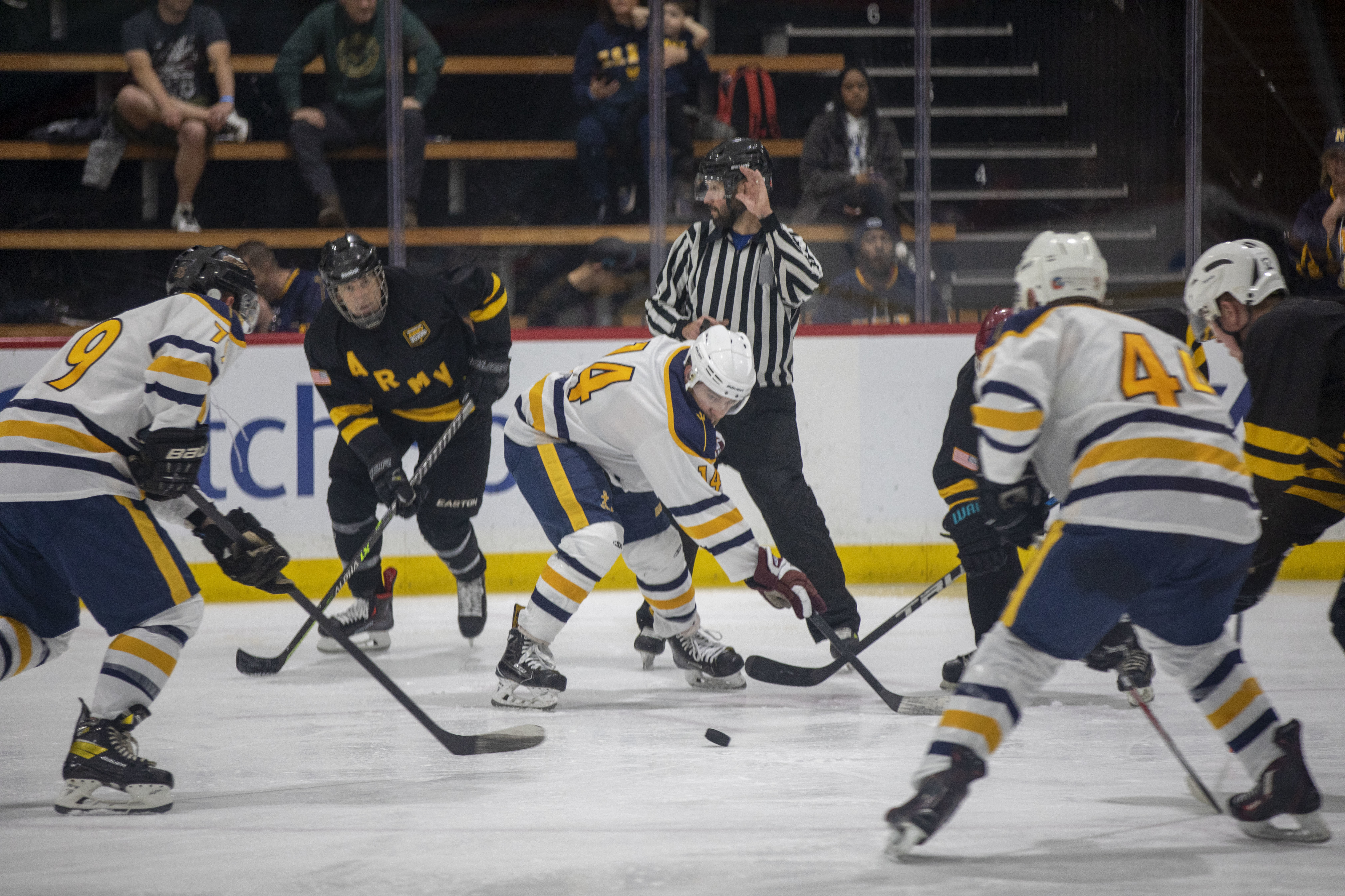 U.S. service members stationed around the Pacific Northwest play hockey in the 6th inaugural Army versus Navy hockey game at the Kraken Community Iceplex in Seattle, Washington, Sept. 25, 2022.