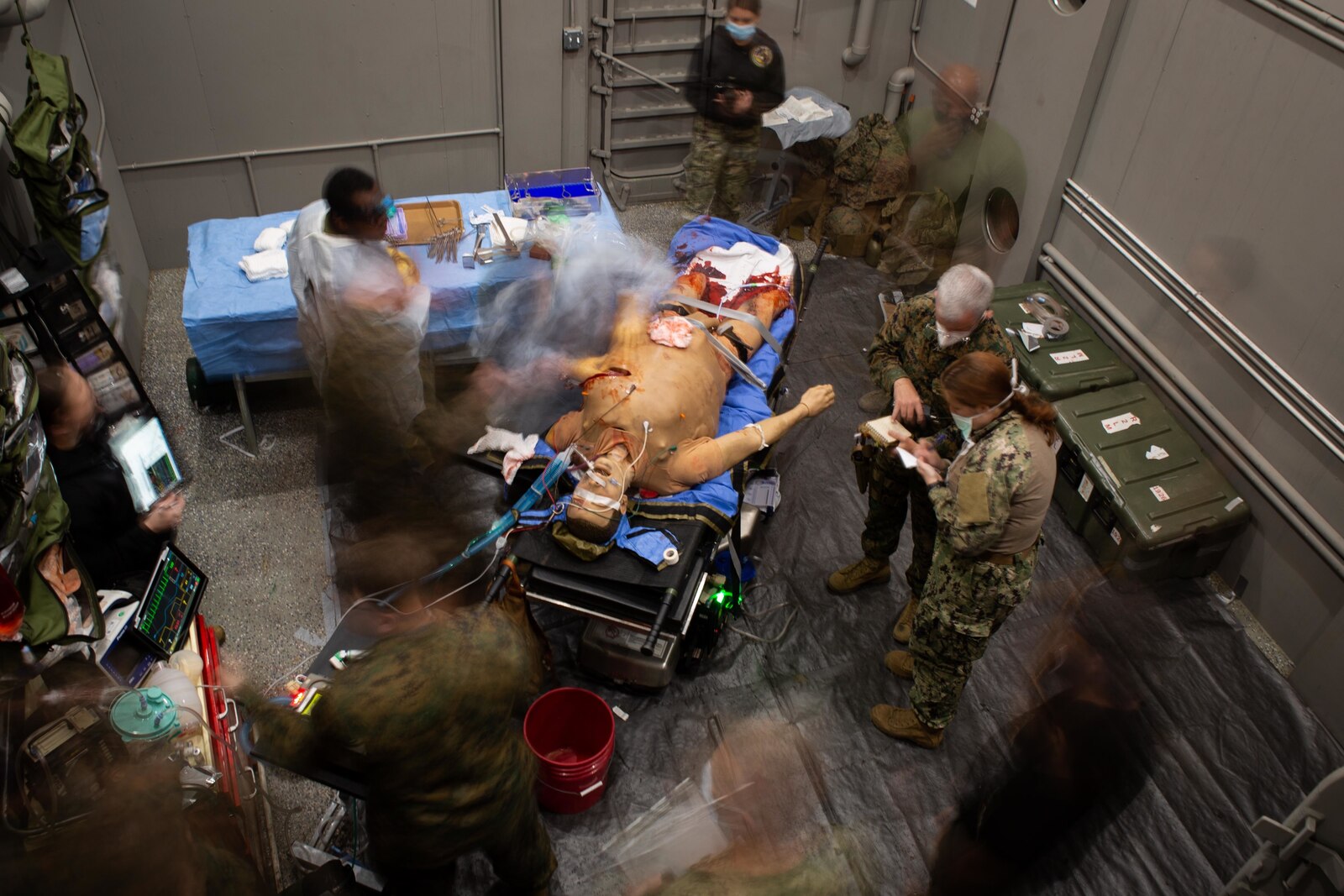 U.S. Navy Lt. Cmdr. Jason Kiser, general surgeon with 1st Medical Battalion, 1st Marine Logistics Group, I Marine Expeditionary force performs surgery on a simulated casualty at the Naval Expeditionary Medical Training Institute Camp Pendleton, California, Jan. 22, 2022.