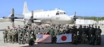 Members of Japan Maritime Self-Defense Force Air Reconnaissance Squadron (VQ) 81 and Fleet Air Reconnaissance Squadron (VQ) 1 pose for a group photo in front of a US Navy EP-3 during Raijin 22-2, an annual unit exchange. Based out of Whidbey Island, Washington, the VQ-1 “World Watchers” are currently operating from Kadena Air Base in Okinawa, Japan. The squadron conducts naval operations as part of a rotational deployment to the U.S. 7th Fleet area of operations.