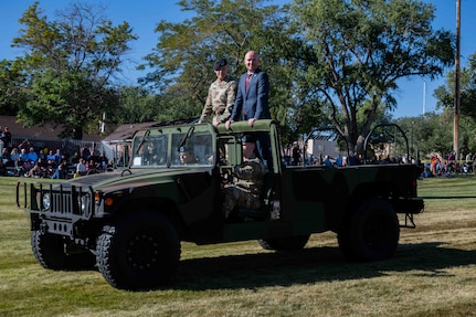 Gov. Spencer J. Cox, commander in chief, and Maj. Gen. Michael J. Turley, the adjutant general, Utah National Guard, conduct a pass in review during the 67th annual Governor’s Day at Camp Williams, Utah, Sept. 24, 2022.