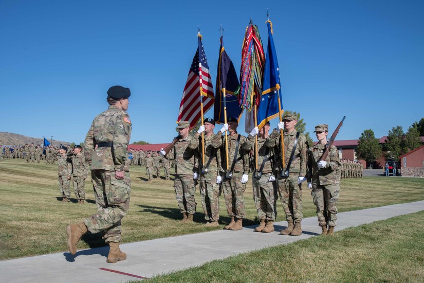 Brig. Gen. Charlene Dalto, commander of the Land Component Command, Utah Army National Guard, takes charge of the colors to open the 67th annual Governor’s day at Camp Williams, Utah, Sept. 24, 2022.