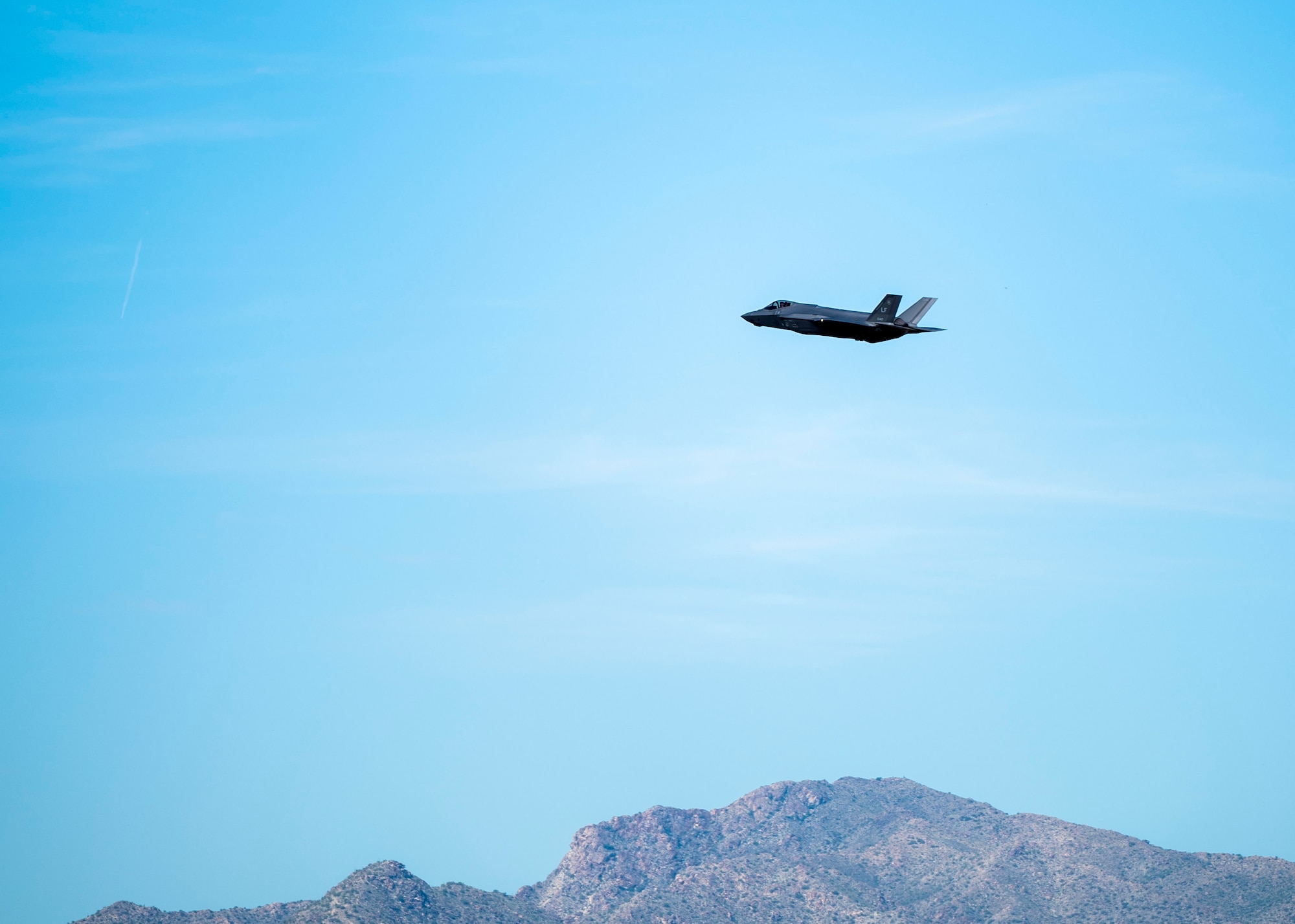 An F-35A Lightning II aircraft soars over the flightline Sept. 23, 2022, at Luke Air Force Base, Arizona.