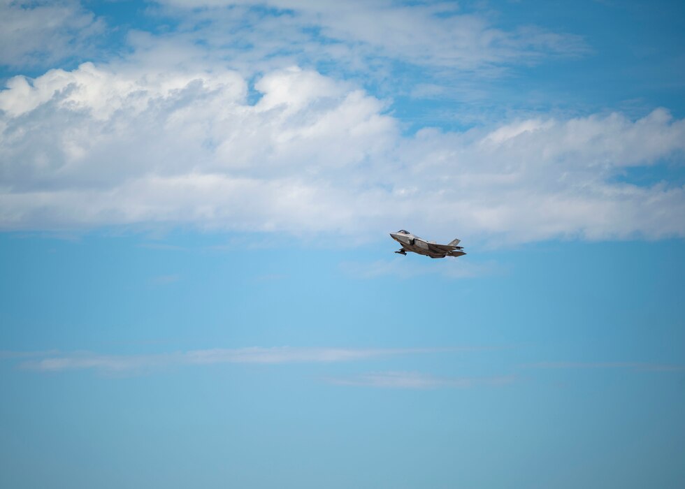 An F-35A Lightning II aircraft flies over the flightline Sept. 23, 2022, at Luke Air Force Base, Arizona.
