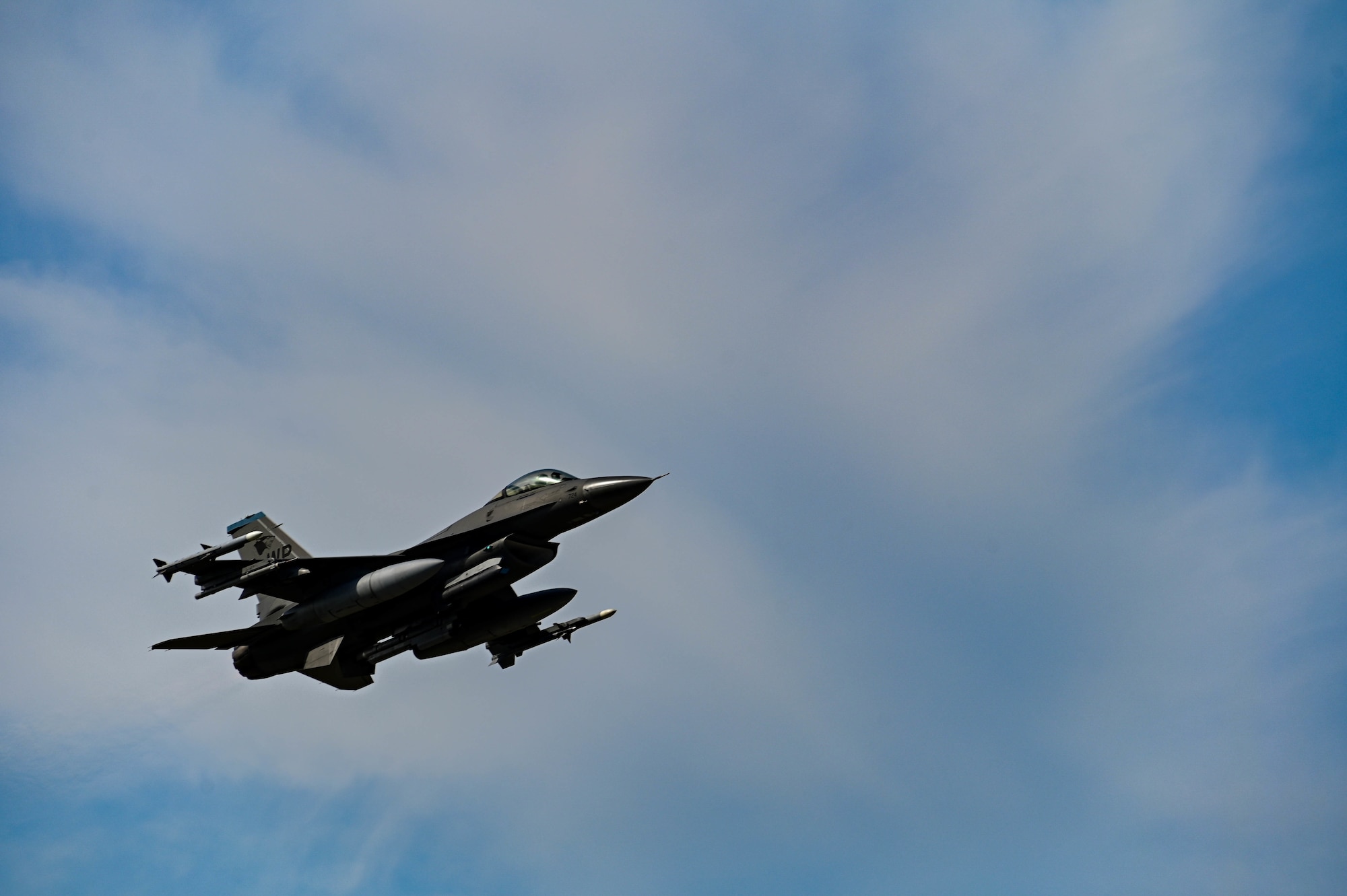 A U.S. Air Force F-16 Fighting Falcon assigned to the 8th Fighter Wing soars through the sky during routine training at Kunsan Air Base, Republic of Korea, Sept. 22, 2022. U.S. and ROKAF service members carried out ​​bilateral training to improve mission focus and force interoperability. (U.S. Air Force Photo by Senior Airman Shannon Braaten)