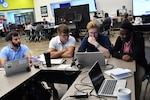 IMAGE: On Sept. 16, Naval Surface Warfare Center Dahlgren Division hosted a Modeling and Simulation Toolbox Hackathon for new employees. The participants were split into teams based on their department with members across different branches.