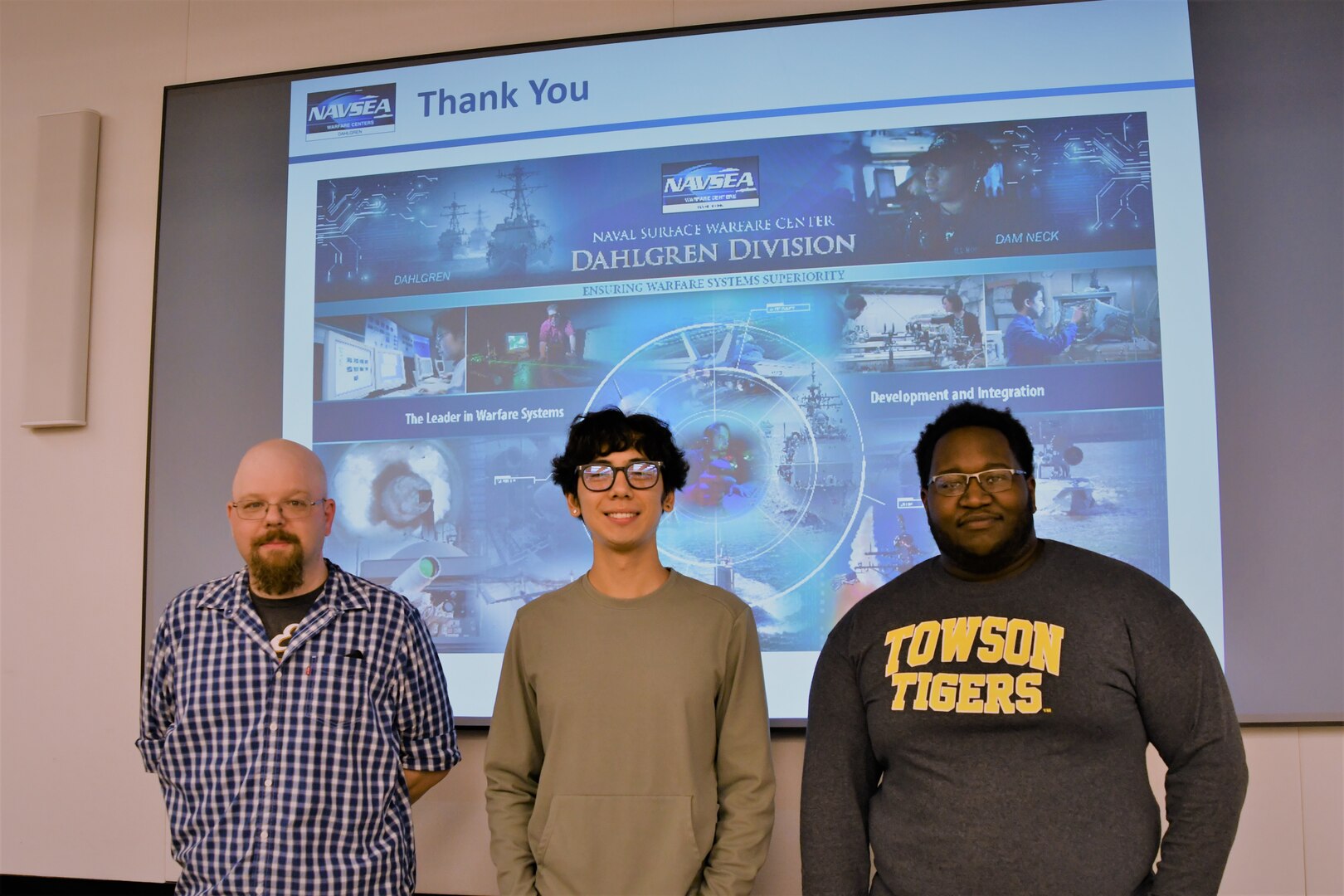 IMAGE: Isaac Erickson from the Naval Surface Warfare Center Dahlgren Division (NSWCDD) Electromagnetic and Sensor Systems Department as well as Micah Webb and Matthew O’Cadiz from the NSWCDD Warfare Analysis and Digital Modeling Department were the Modeling and Simulation Toolbox Hackathon winners from the Sept. 16 competition. The trio used a combination of ideas from their varied backgrounds to pull ahead of the other teams.