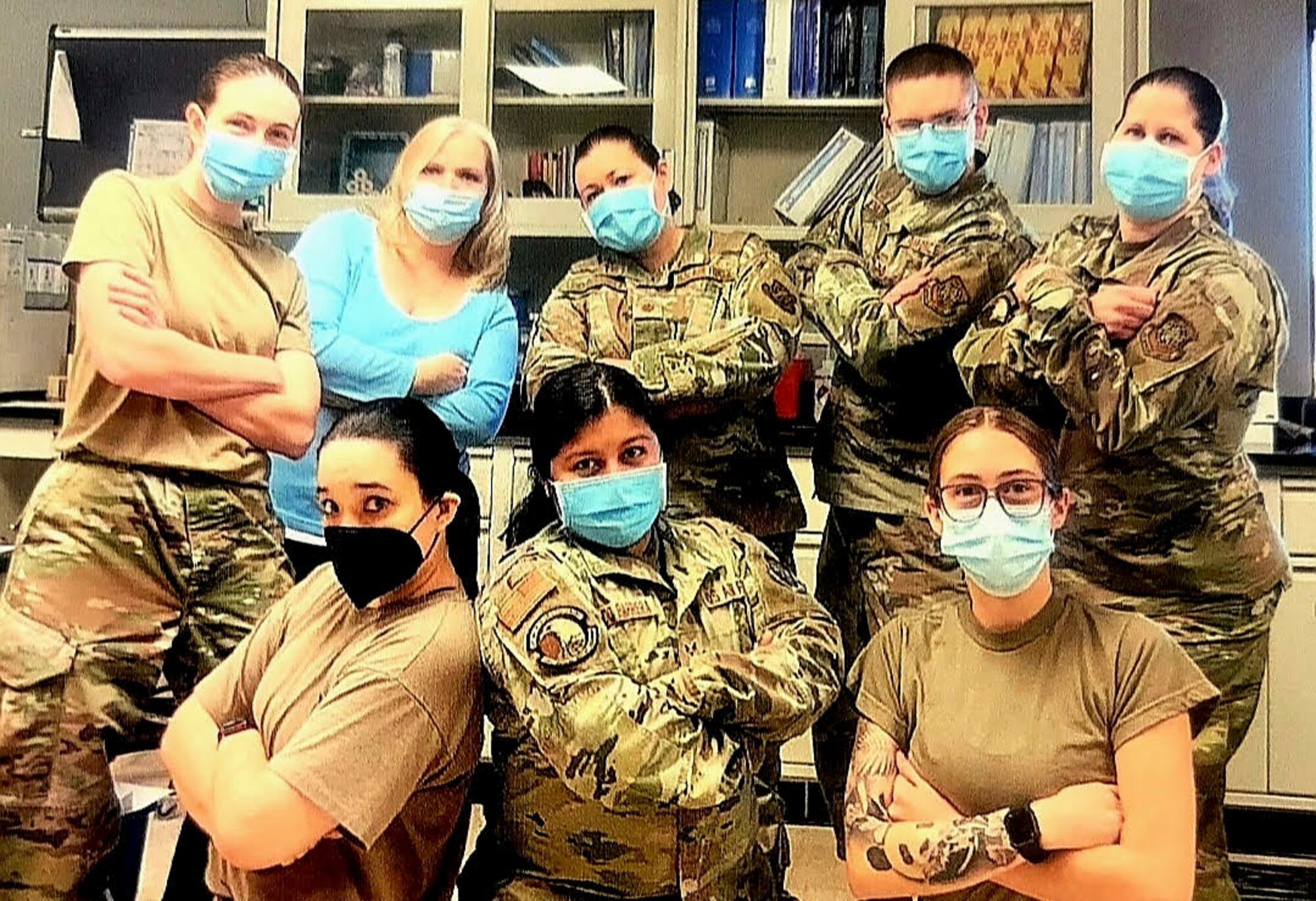 RaeAnn Rivera, back row second from the left, poses for a photo with Airmen from the 436th Medical Group at Dover Air Force Base, Delaware. Rivera recently retired after 35 years of service as the technical and laboratory supervisor at the 436th MDG. (Courtesy photo)