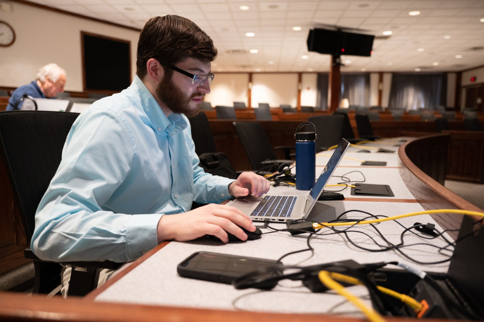 Image of civilian working at desk