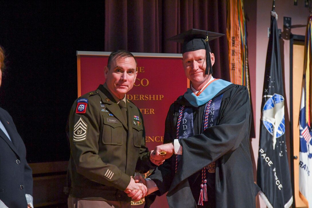 Sgt. Maj. Jon Whaley graduates with a Masters of Science degree in Instructional Design, Development and Evaluation from Syracuse University’s School of Education during a ceremony held Aug. 23, 2022, at Fort Bliss, Texas. Whaley is participating in the U.S. Army Sergeant Major Academy Fellowship Program.