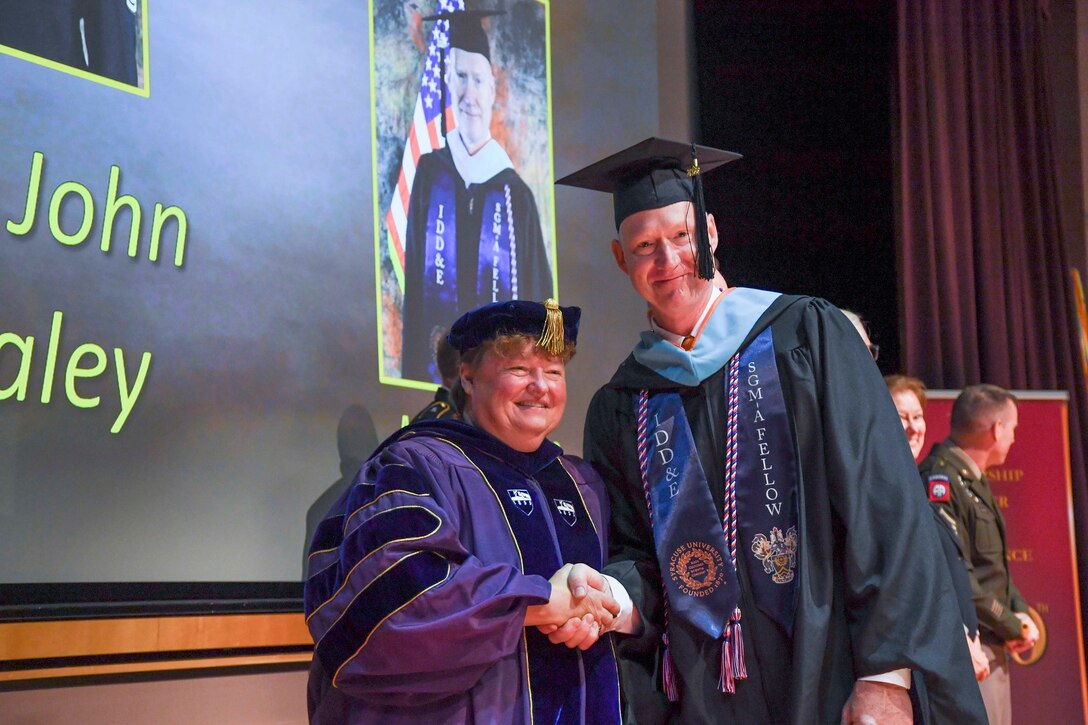 Sgt. Maj. Jon Whaley graduates with a Masters of Science degree in Instructional Design, Development and Evaluation from Syracuse University’s School of Education during a ceremony held Aug. 23, 2022, at Fort Bliss, Texas. Whaley is participating in the U.S. Army Sergeant Major Academy Fellowship Program.