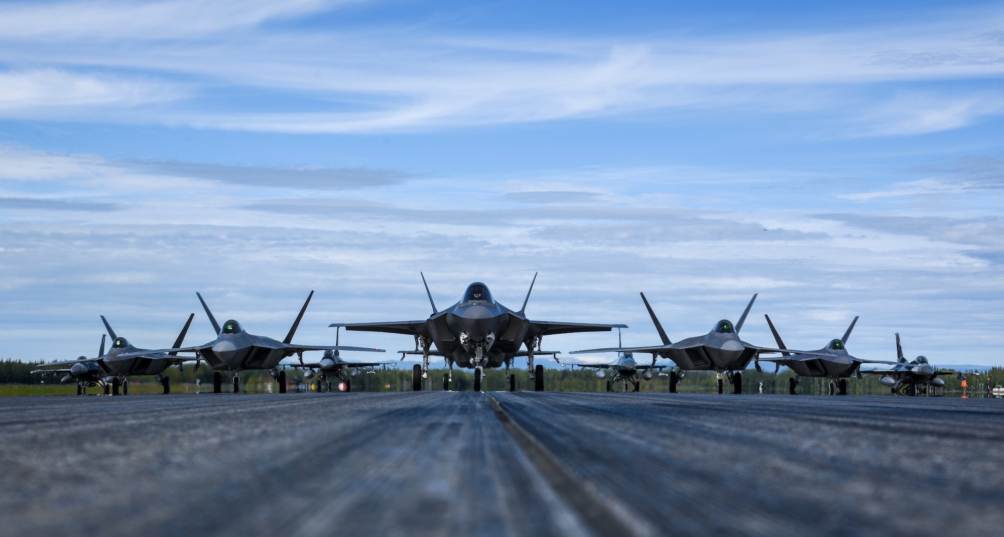 Fighter jets line up on the flightline for a capabilities demonstration