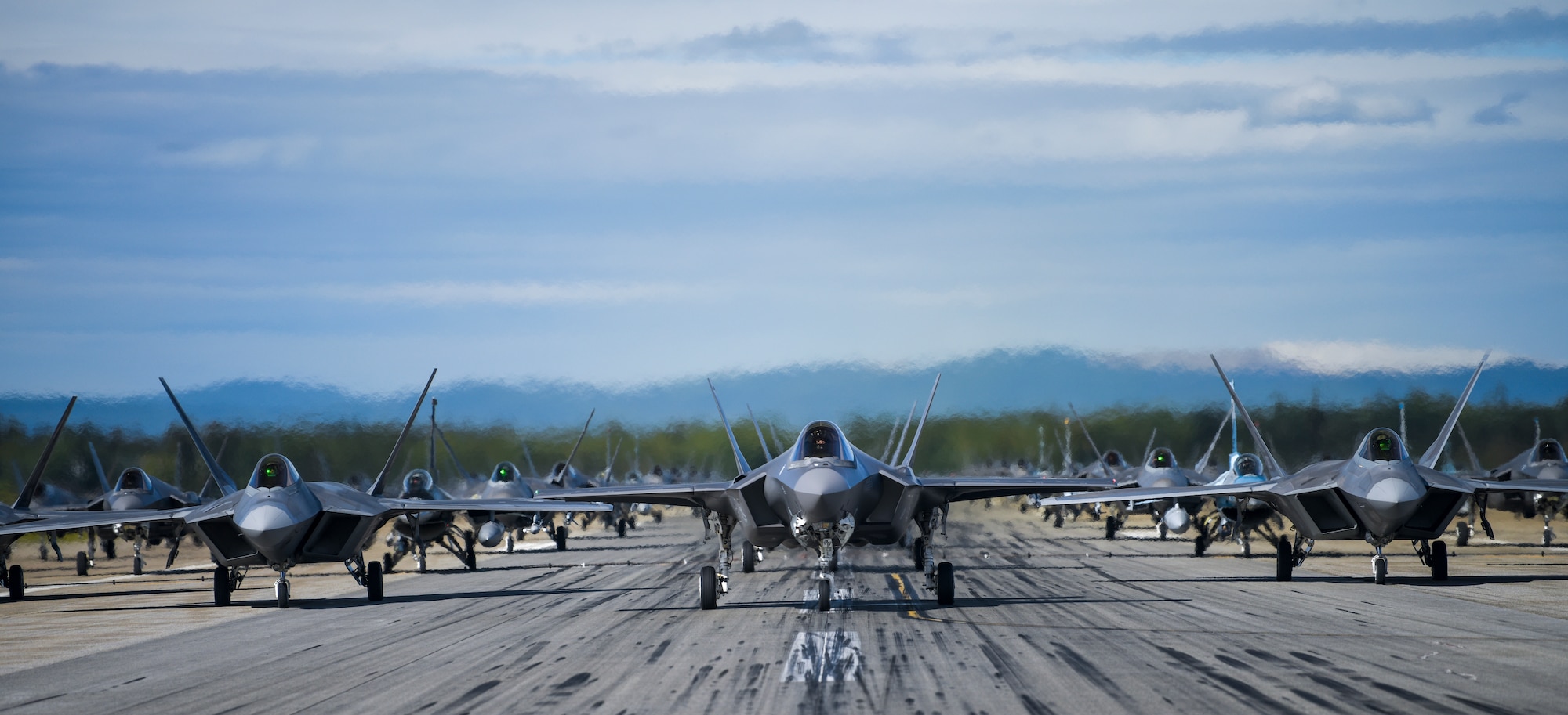 Fighter jets line up on the flightline for a capabilities demonstration