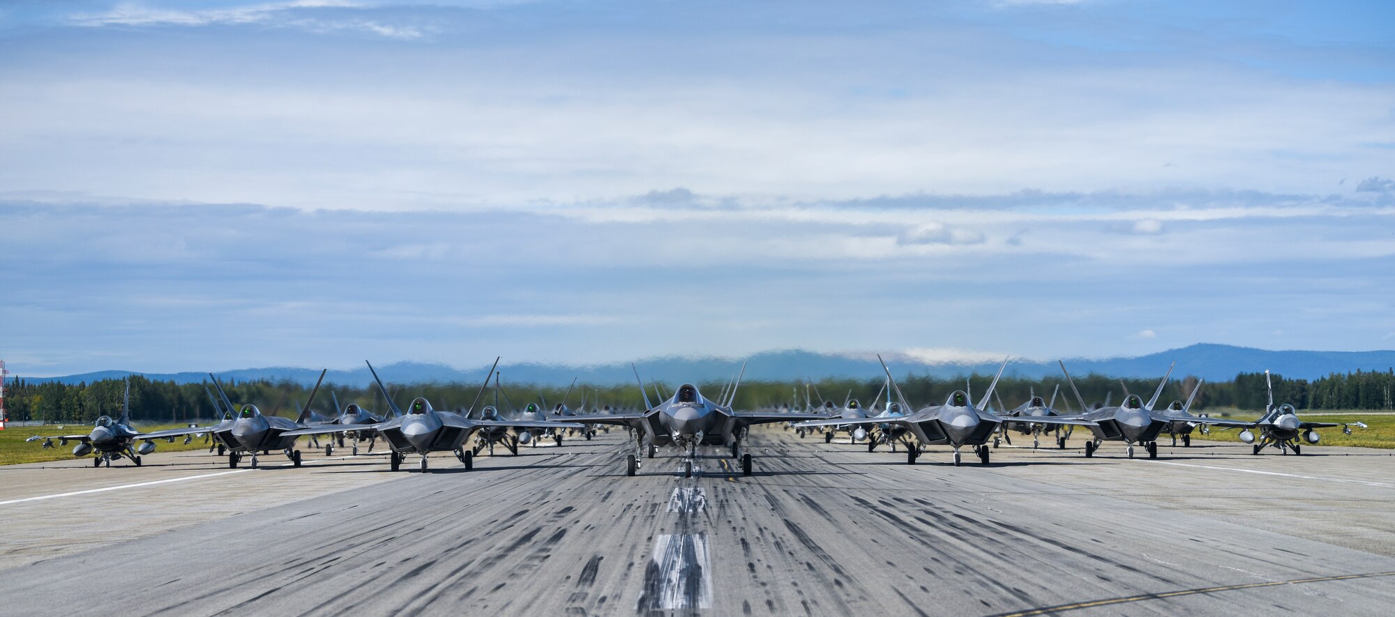 Fighter jets line up on the flightline for a capabilities demonstration