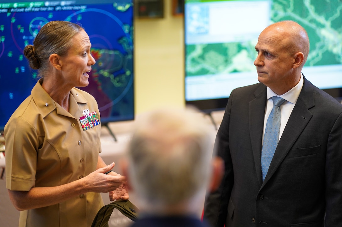 U.S. Marine Corps Brig. Gen. Maura Hennigan, Marine Corps University President, and Timothy Barrick, Wargaming Director, Krulak Center for Innovation and Future Warfare, MCU, host the opening of the MCU Wargaming Cloud ribbon cutting ceremony at Warner Hall on Marine Corps Base Quantico, Virginia, Sept. 23, 2022. The Wargaming Cloud enables faculty and students of MCU to access a wide range of commercial and government wargaming tools using their personal devices from anywhere. (U.S. Marine Corps photo by Cpl. Eric Huynh)