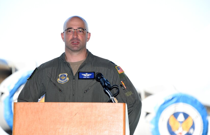 U.S. Air Force Lt. Col. Eric Kut, 6th Airlift Squadron, speaks to attendees at the 305th Air Mobility Wing’s ceremony for the presentation of Chief of Staff of the Air Force 2021 Exceptional Aviator Award on Joint Base McGuire-Dix-Lakehurst, N.J., Sept. 26, 2022. The CSAF 2021 Exceptional Aviator Award was presented to U.S. Air Force Lt. Col. Eric Kut, 6th Airlift Squadron Chief of Group Standards and Evaluations, by the Order of the Daedalians for his actions as the aircraft commander of the REACH871 mission. This mission resulted in the ground evacuation of 823 Afghan civilians from Kabul while under enemy fire and allowed the Air Mobility Command commander to waive C-17 floor-load restrictions from 300 to 450 passengers, facilitating the evacuation of 124,000 personnel during the Air Force’s largest non-combatant evacuation operation in history. (U.S. Air Force photo by Daniel Barney)