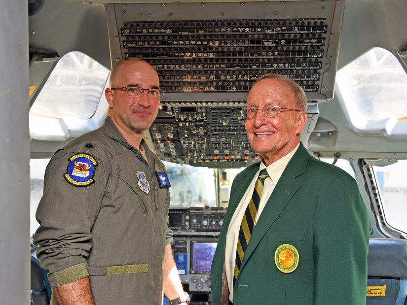 U.S. Air Force Lt. Col. Eric Kut, 6th Airlift Squadron, and Retired U.S. Air Force Maj. Gen. Jerrold Allen, Order of the Daedalians national commander, pose for a picture inside the cockpit of a C-17A Globemaster III belonging to the 305th Air Mobility Wing on Joint Base McGuire-Dix-Lakehurst, N.J., Sept. 26, 2022. The CSAF 2021 Exceptional Aviator Award was presented to U.S. Air Force Lt. Col. Eric Kut, 6th Airlift Squadron Chief of Group Standards and Evaluations, by the Order of the Daedalians for  his actions as the aircraft commander of the REACH871 mission.This mission resulted in the ground evacuation of 823 Afghan civilians from Kabul while under enemy fire and allowed the Air Mobility Command commander to waive C-17 floor-load restrictions from 300 to 450 passengers, facilitating the evacuation of 124,000 personnel during the Air Force’s largest non-combatant evacuation operation in history. (U.S. Air Force photo by Daniel Barney)