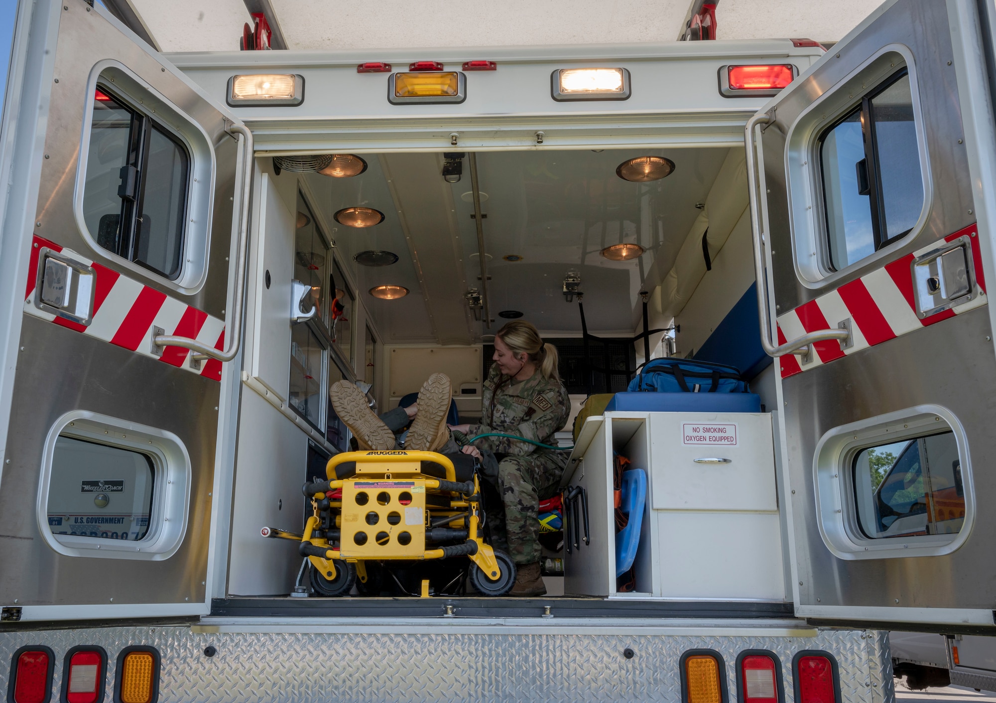 Tech. Sgt. Haley Bass, 4th Medical Group flight medicine NCO in charge, secures an aviator mask onto Capt. Karen Rodriguez, 4th MDG flight surgeon at Seymour Johnson Air Force Base, North Carolina, Sept. 23, 2022. The 4th MDG flight medicine unit supports all aircrew by determining flight fitness, detecting medical hazards and managing medicine programs. (U.S. Air Force photo by Airman 1st Class Sabrina Fuller)