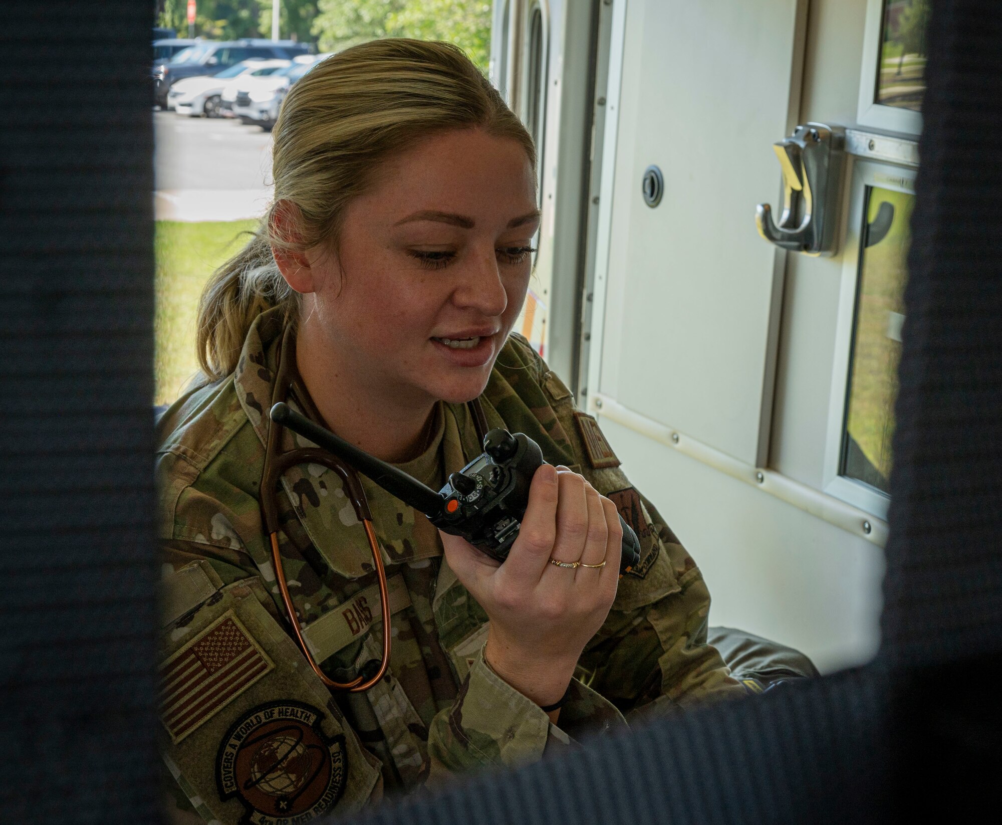 Tech. Sgt. Haley Bass, 4th Medical Group flight medicine NCO in charge, radios a nearby hospital, at Seymour Johnson Air Force Base, North Carolina, Sept. 23, 2022. The 4th MDG flight medicine unit supports all aircrew by determining flight fitness, detecting medical hazards and managing medicine programs. (U.S. Air Force photo by Airman 1st Class Sabrina Fuller)