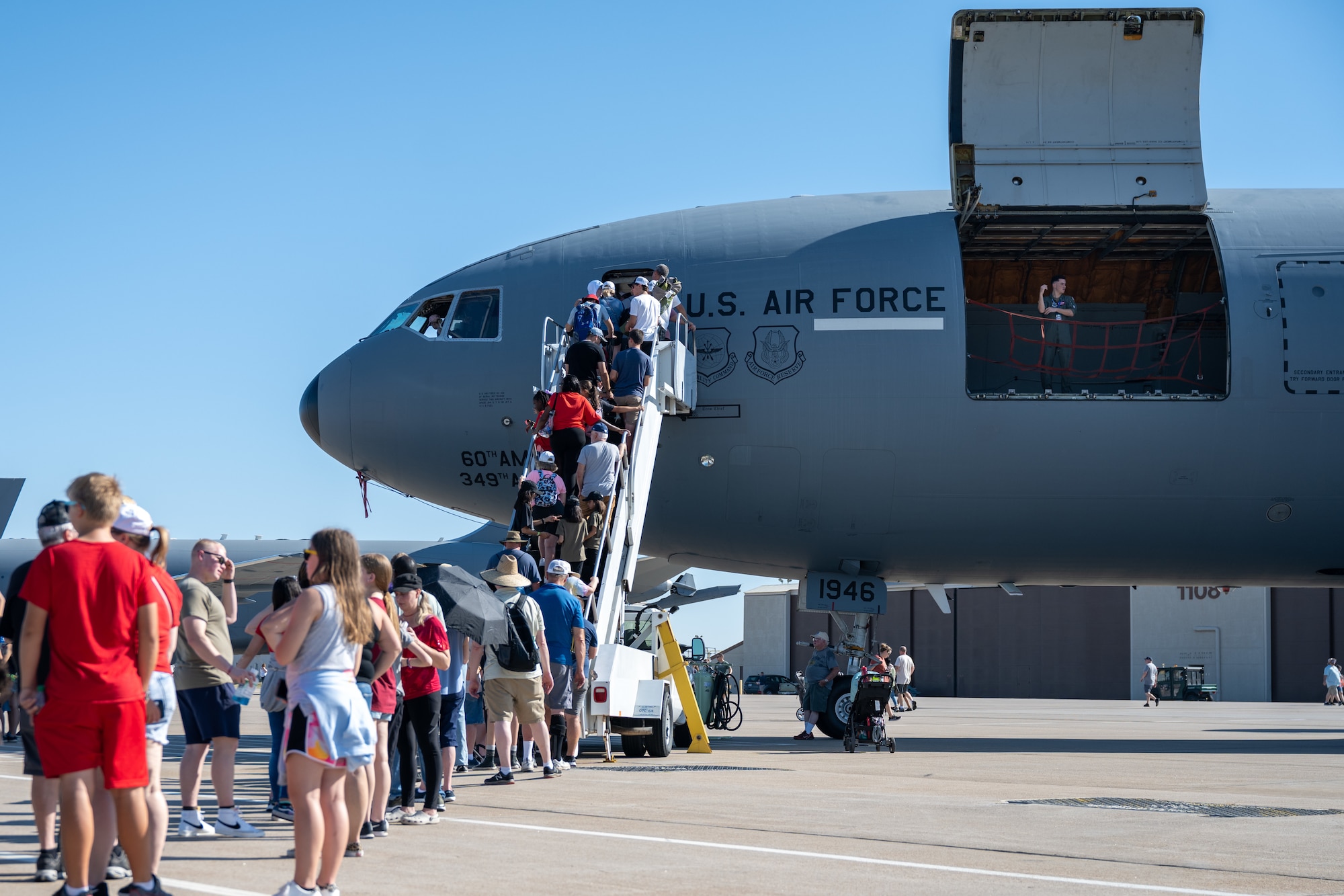 Visitors tour a KC-10 from Travis Air Force Base, Calif., during the Frontiers in Flight airshow at McConnell Air Force Base, Kansas, Sept. 24, 2022.