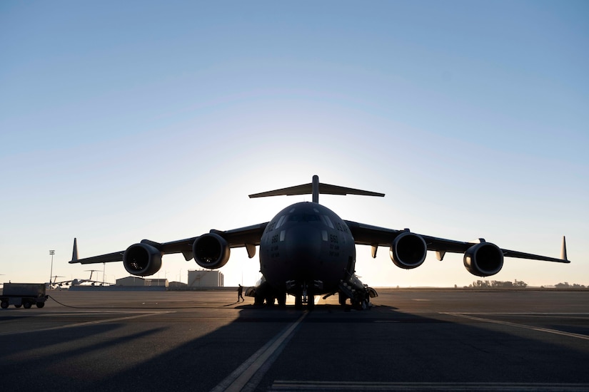 An aircraft sits on a runway.