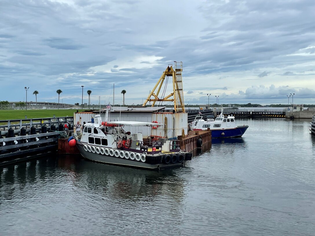 Workboats and a barge came through the Canaveral Lock for a safe harbor lockage prior to the suspension of operations at Corps Navigation Locks in Florida due to expected impacts from Hurricane Ian.